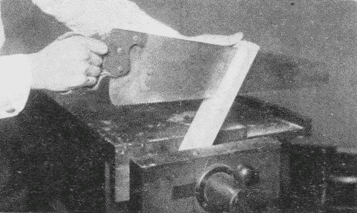 Fig. 89. Rip-sawing with Wood Held in Bench-Vise.