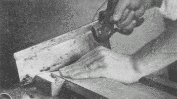 Fig. 90. Using the Back-Saw with Bench-Hook.