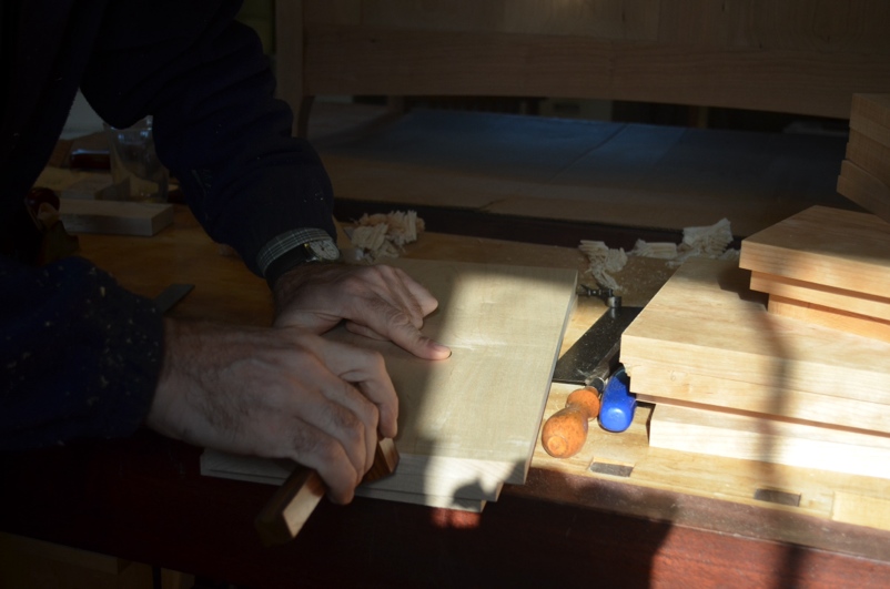 Marking the dovetail base line with a cutting gauge
